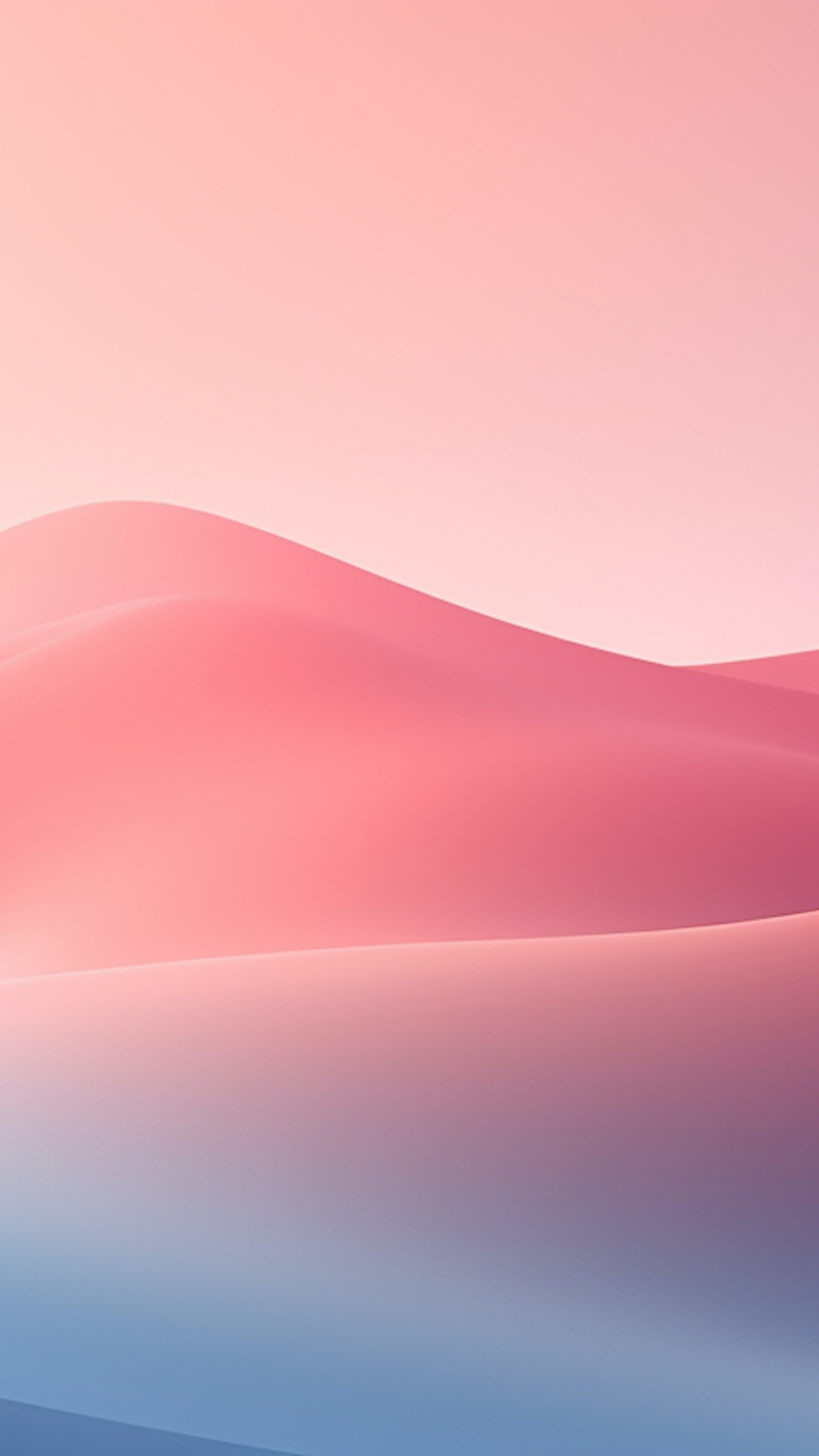 Soft pink hills rise in the distance, set against a gradient sky.