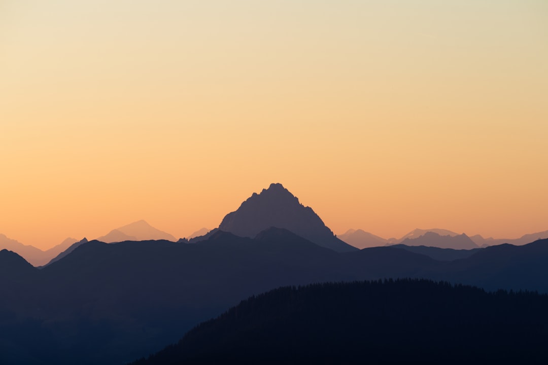 Golden mountains bathed in sunset light.