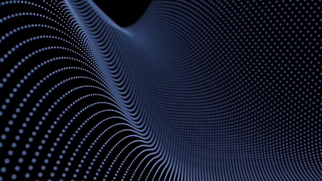 A swirling pattern of dots and lines creates a mesmerizing visual effect.