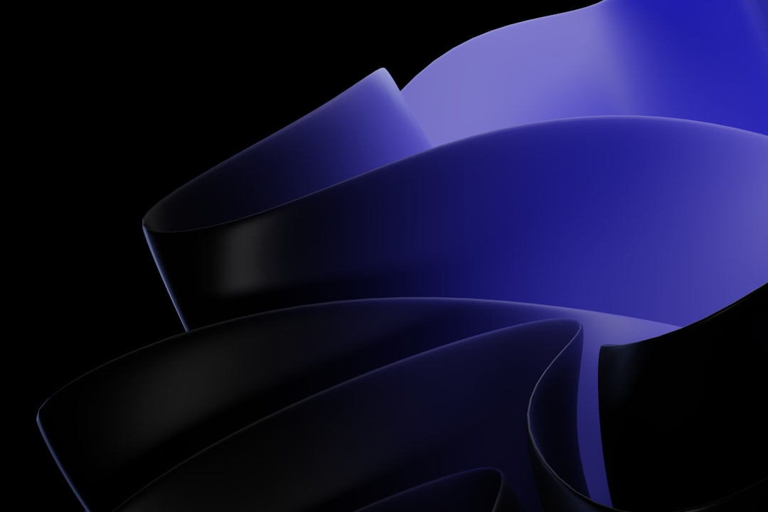 Silhouetted blue and black shapes against a stark black background.