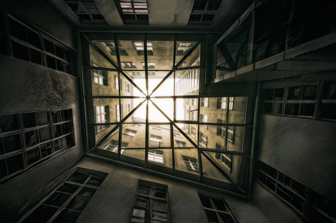 Sunlight streams through a geometrically shaped skylight.