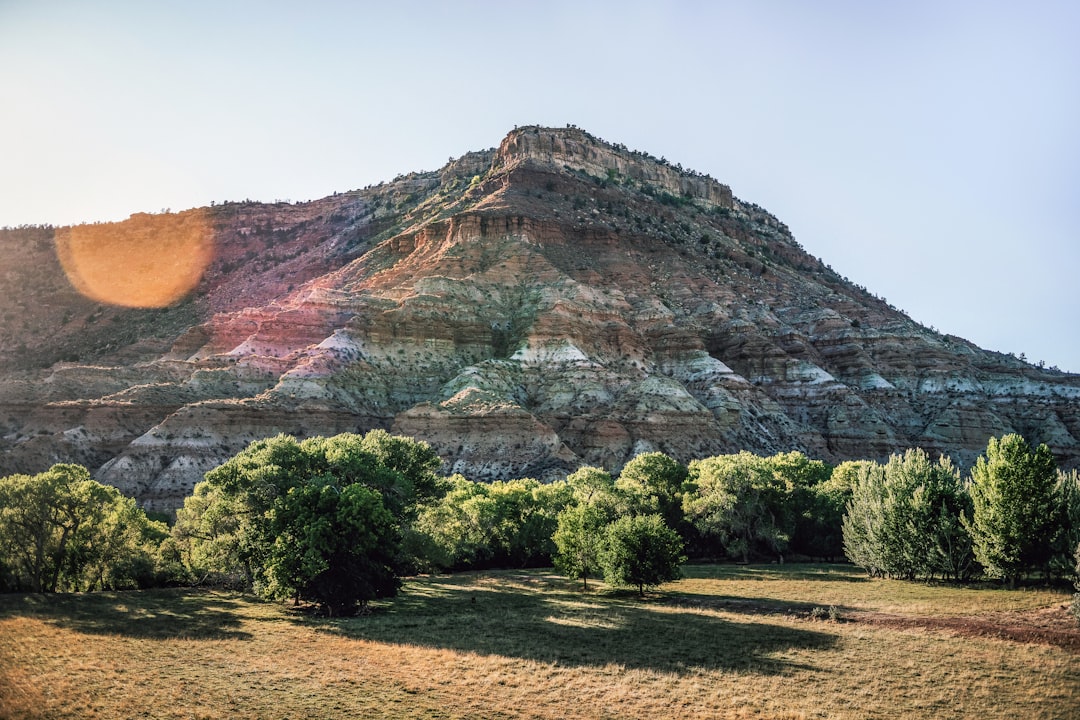 A majestic mountain landscape bathed in sunlight.