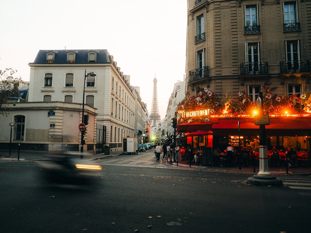 A Parisian street scene unfolds, with the iconic Eiffel Tower standing tall in the distance.