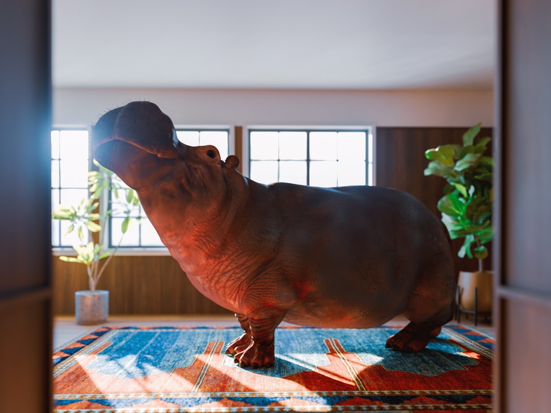 A hippopotamus stands on a colorful rug, bathed in sunlight.