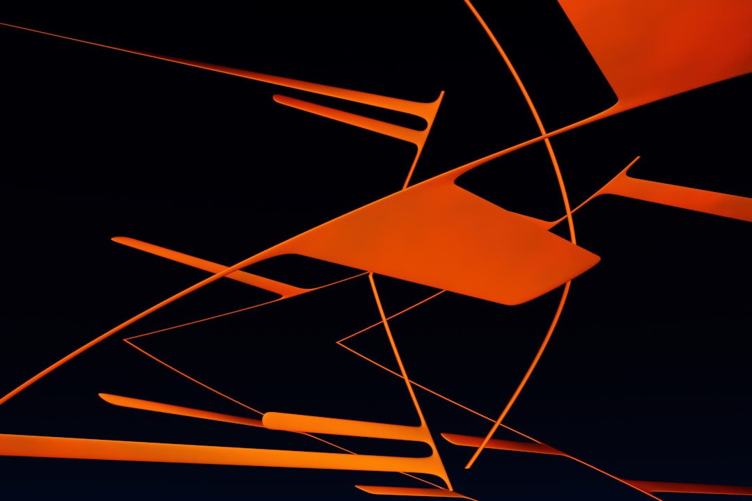 Orange shapes against a black background.