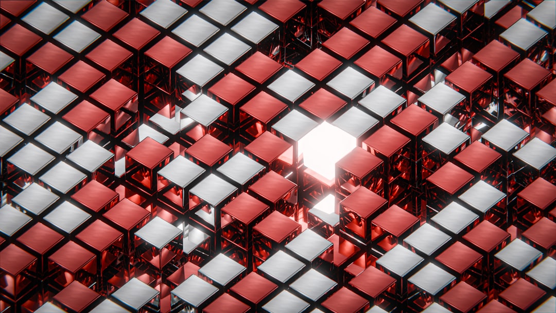 A radiant white cube stands out amidst a sea of red and white cubes, its central position drawing the eye.