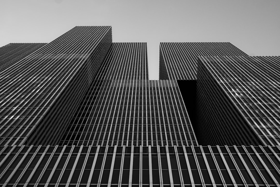 Black skyscrapers tower into the sky.
